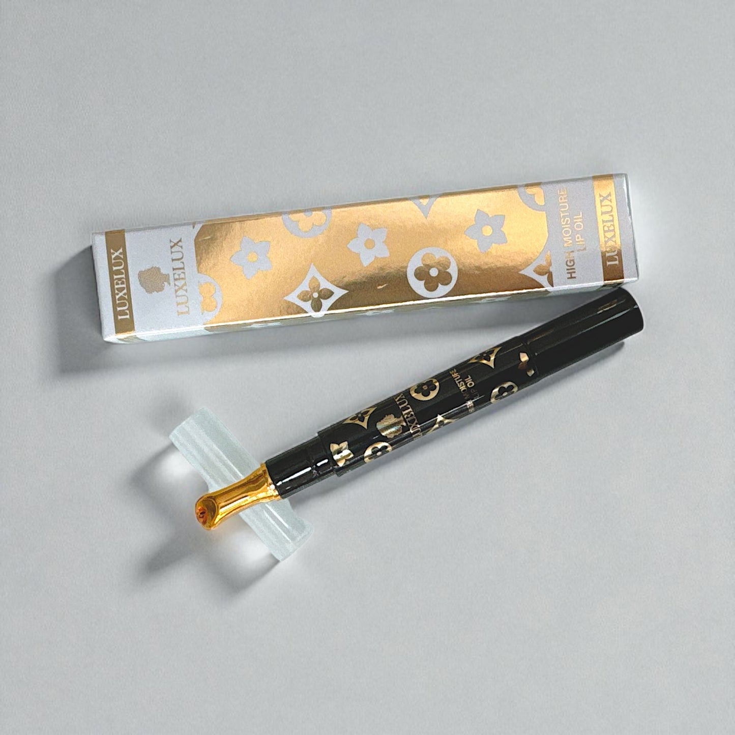 Luxelux High Moisture Lip Oil 2 ml – obrotowy aplikator